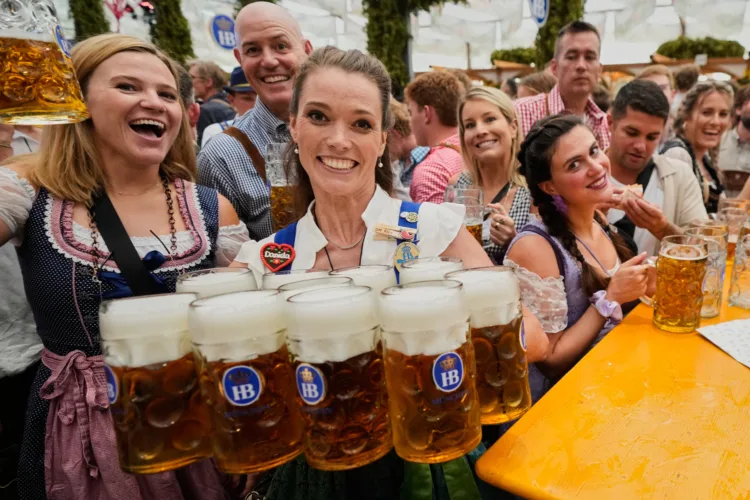 Munich's Oktoberfest roars to life as the mayor taps the first keg
